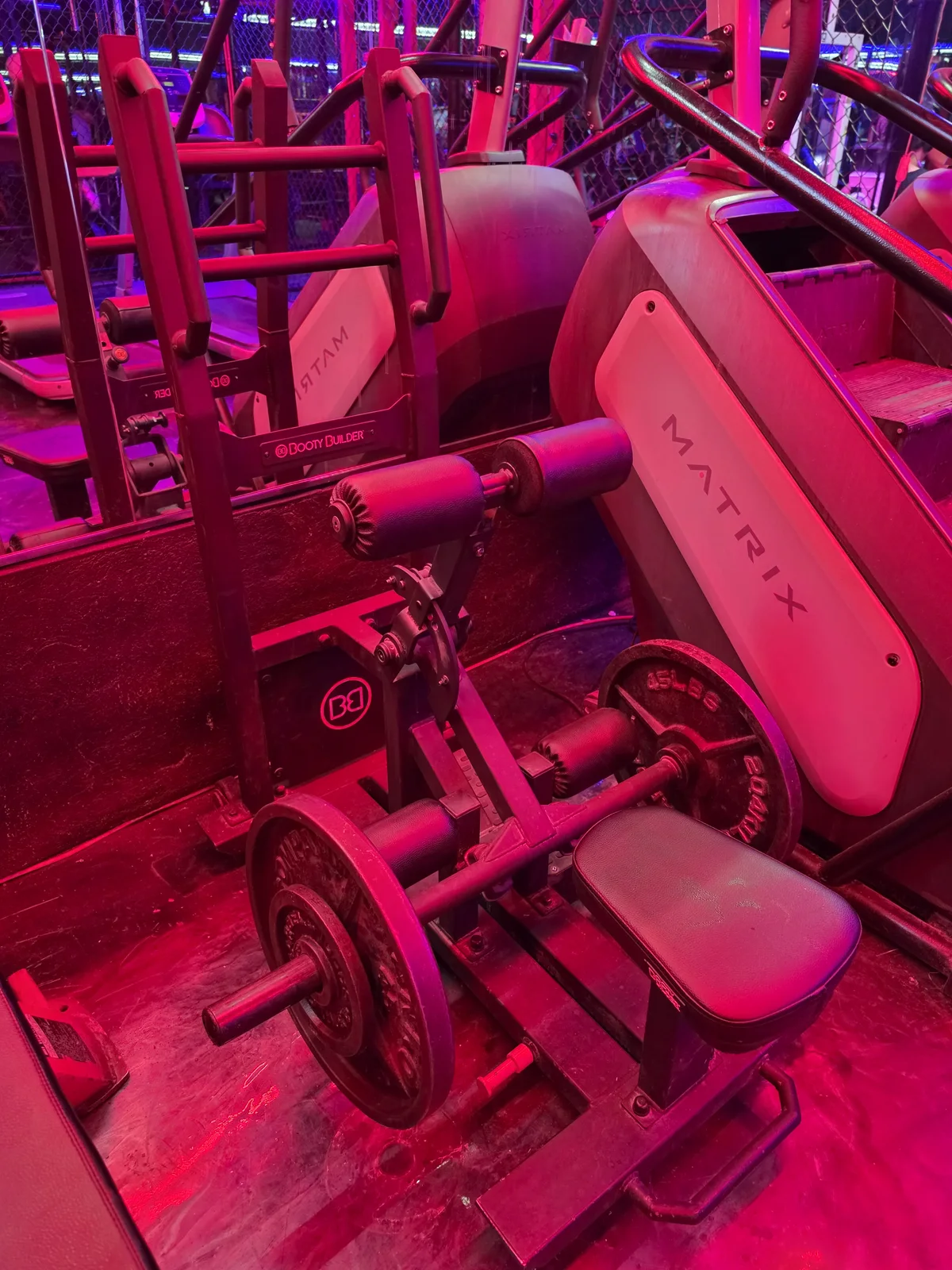 Booty Builder standing hip thrust machine at Iron Arms Gym