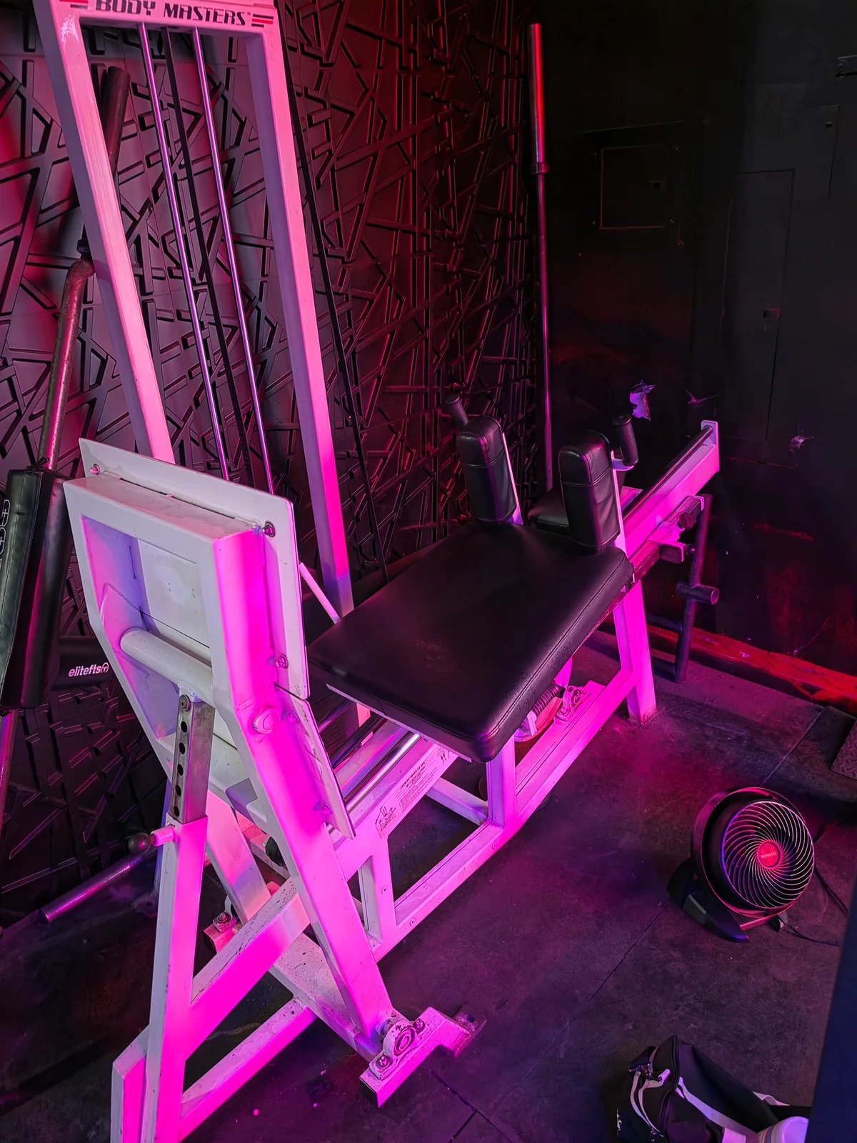 Body Masters lateral squat machine at Iron Arms Gym