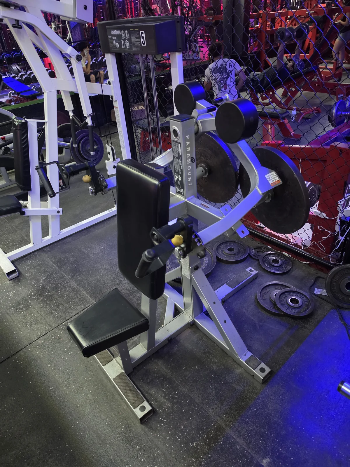 Paramount plate-loaded converging shoulder press at Iron Arms Gym