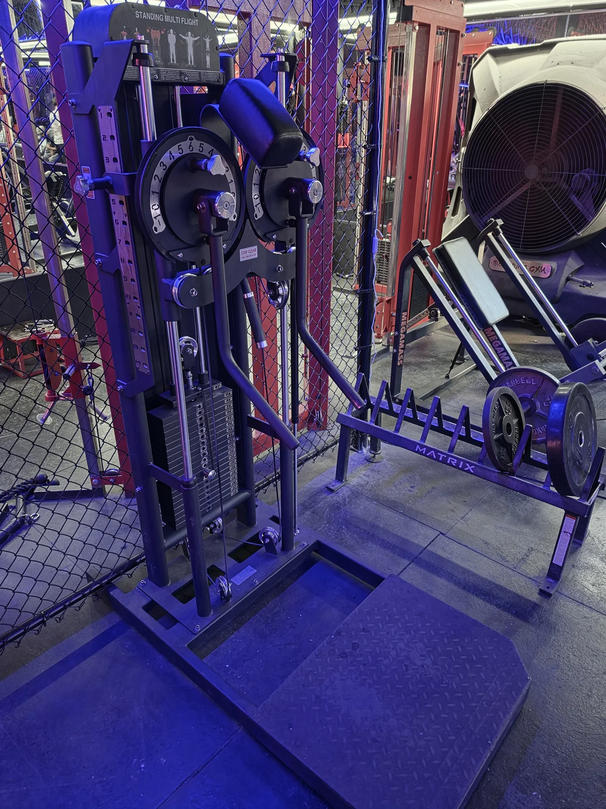 Adjustable weight-stack lateral raise and chest fly machine at Iron Arms Gym