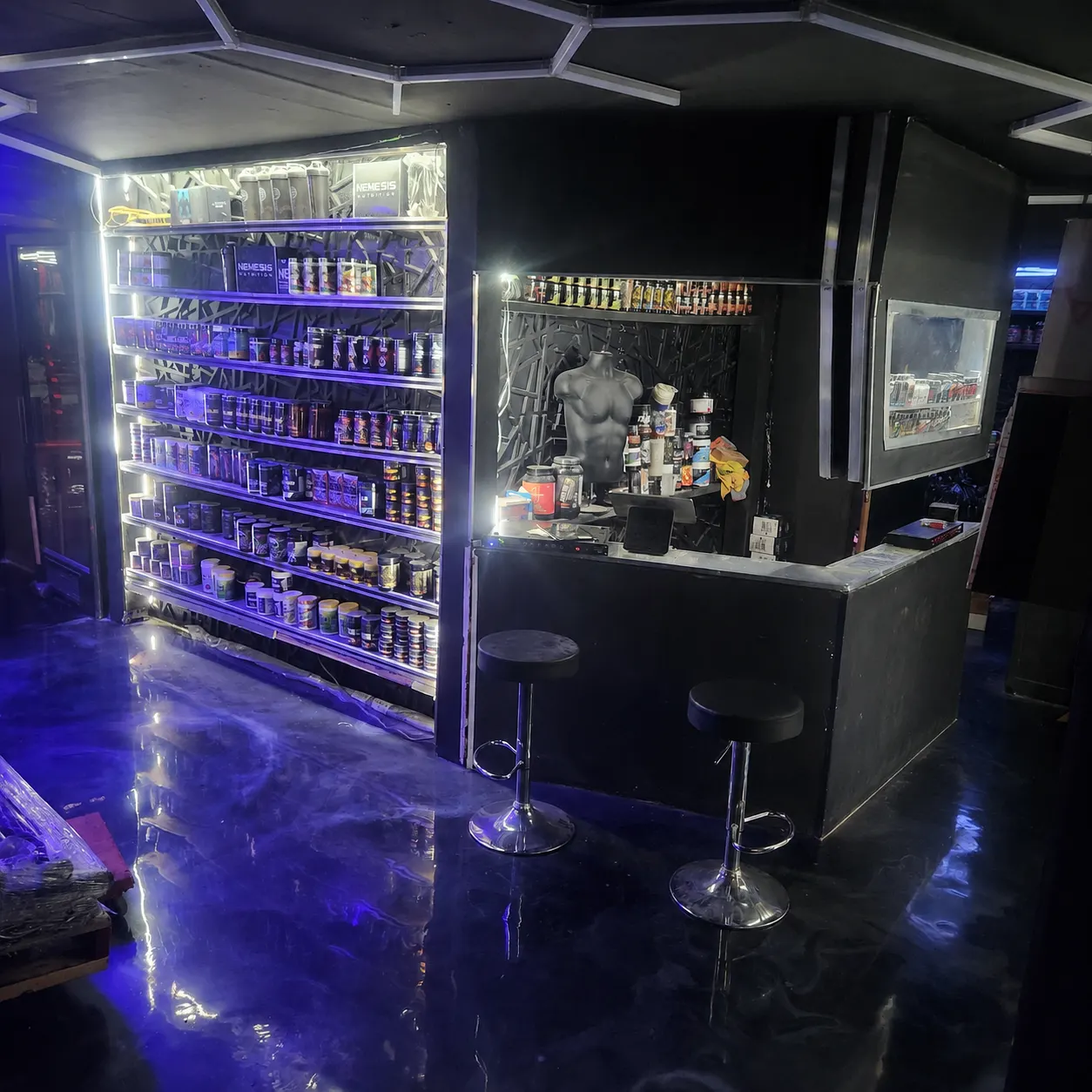 Staffed office and supplement store at Iron Arms Gym